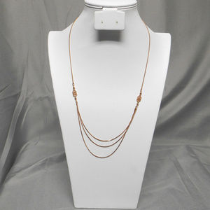 Artistry gold tone triple chain bottom necklace